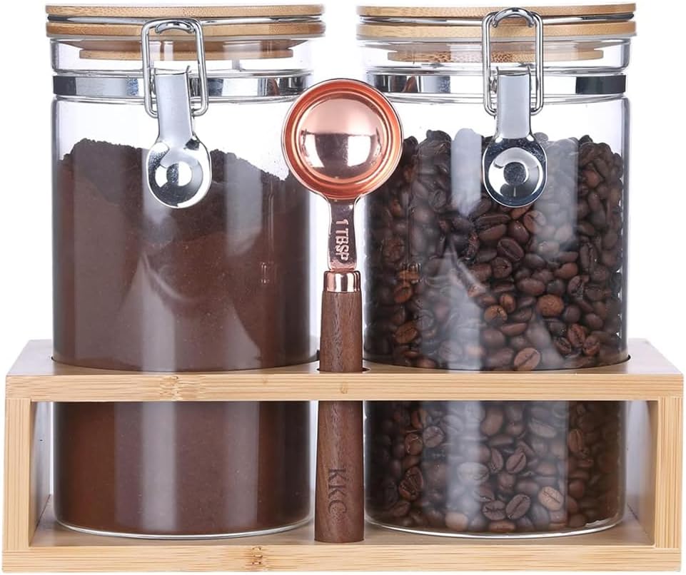 KKC HOME ACCENTS Glass Canister Set Airtight Clamp Jar with Scoop Rack 40oz | Airtight glass food jars with metal locking clamp, wooden handle scoop, and bamboo rack for counter organization.
