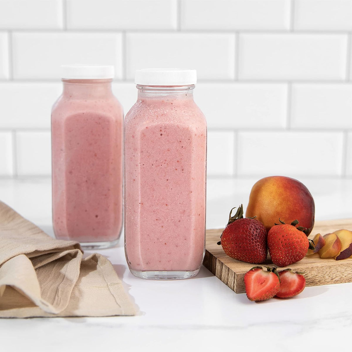 kitchentoolz 16oz Glass Milk Bottles with Lids – 16 oz Reusable Glass Bottles for Milk, Creamer, Juice, Smoothies, Kefir &amp; Yogurt – Airtight Square Drinking Jars for Lunch Box &amp; Fridge – 4 Pack