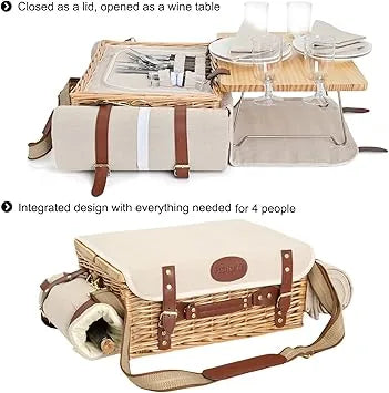 Couple using insulated picnic set with table on outdoor grass