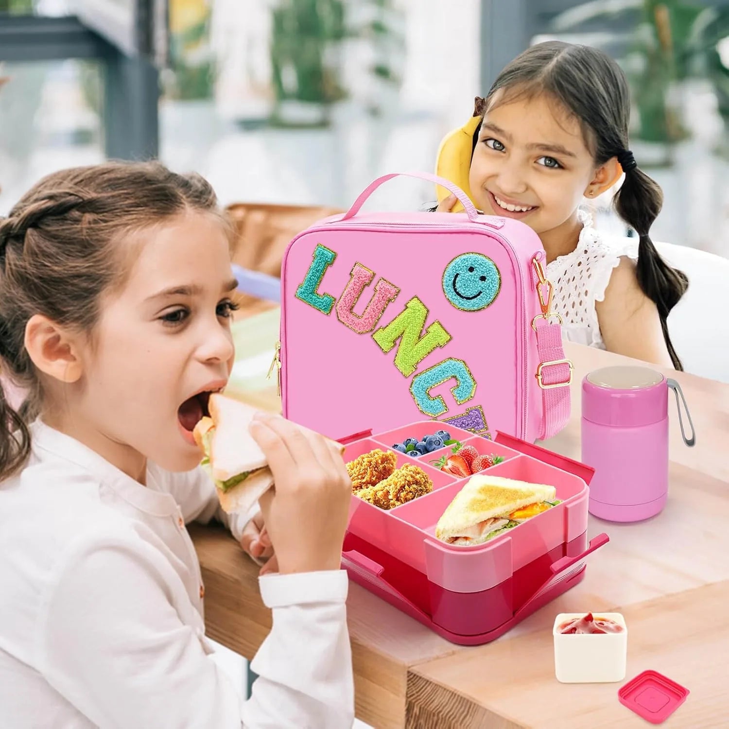 Durable nylon insulated lunch bag with pink bento box compartments kids