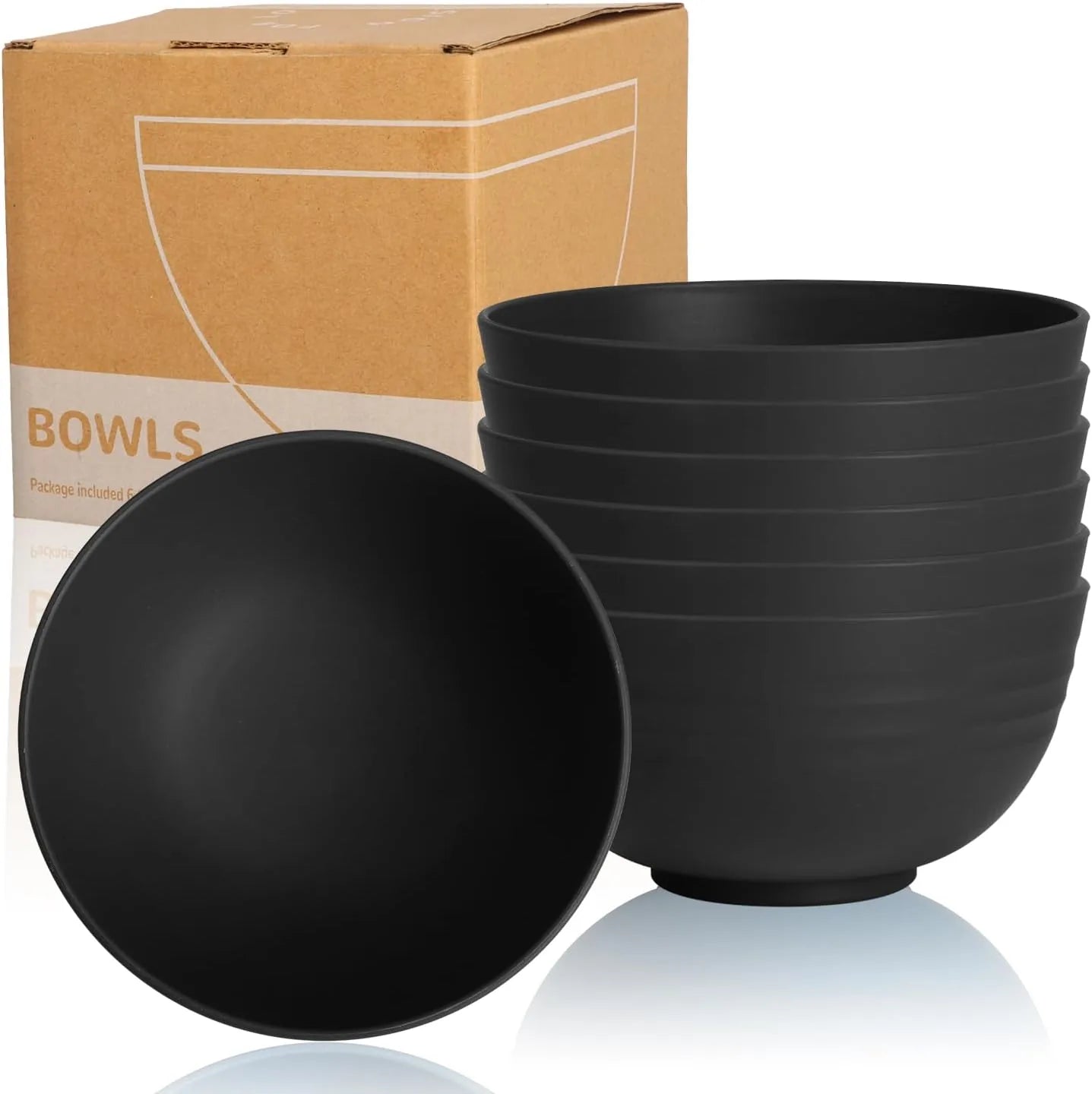 Set of 6 black wheat straw camping bowls stacked together outdoors